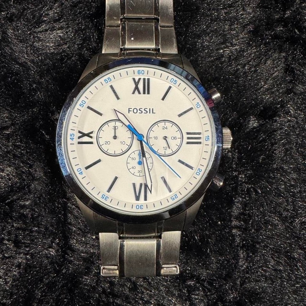 Fossil Chronograph Watch Silver, white dial, blue accents, and Roman numerals